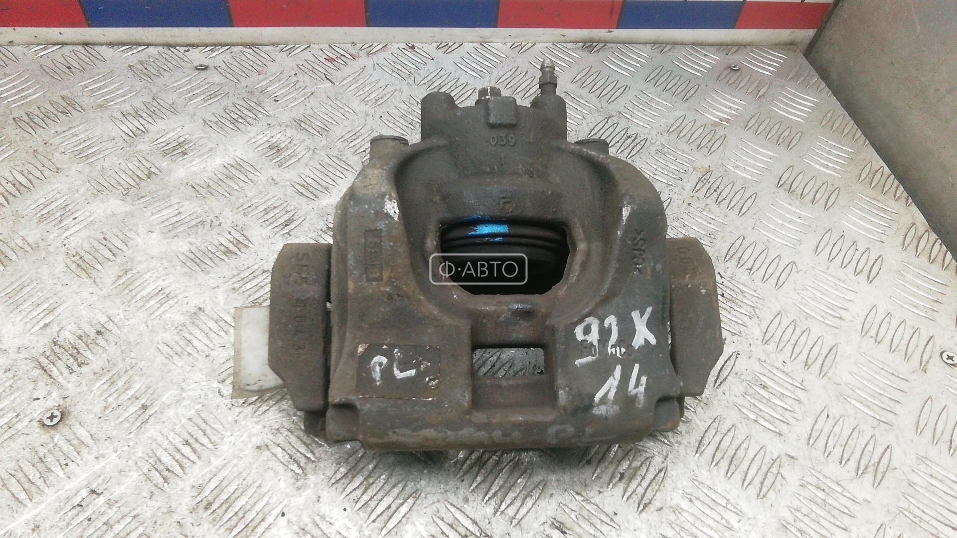 Суппорт тормозной передний левый