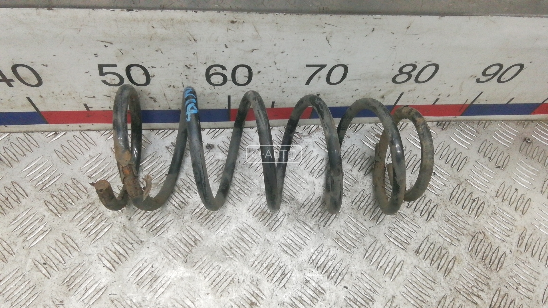 Пружина задняя