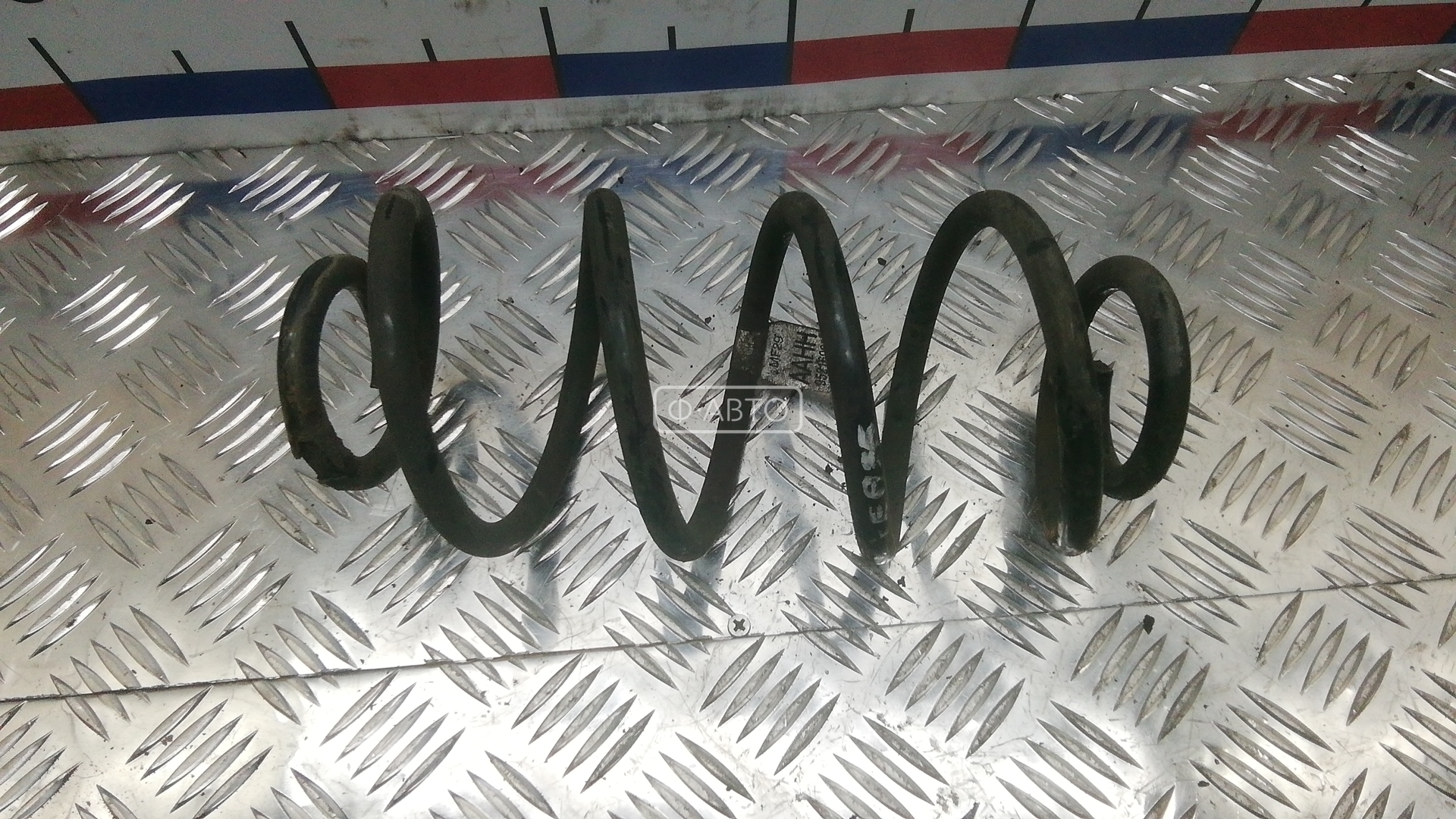 Пружина задняя