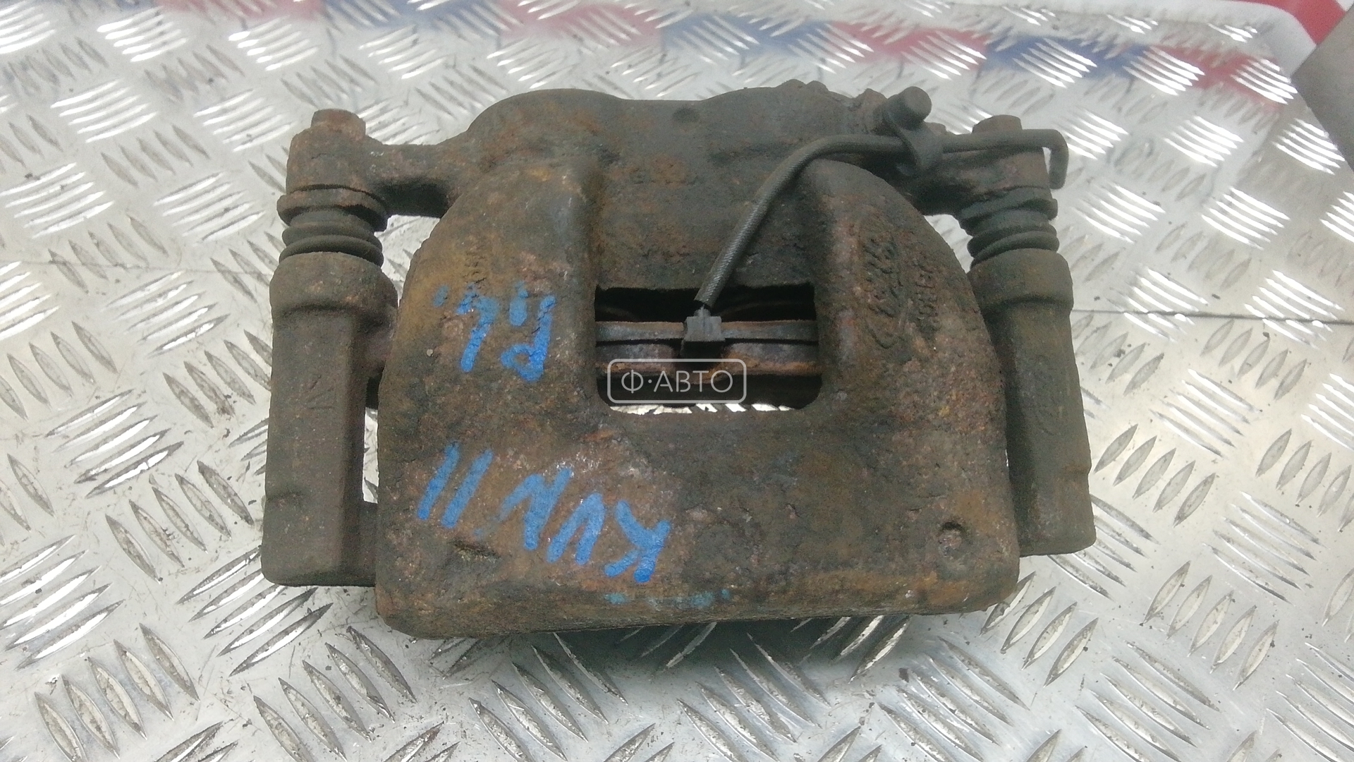 Суппорт тормозной передний левый