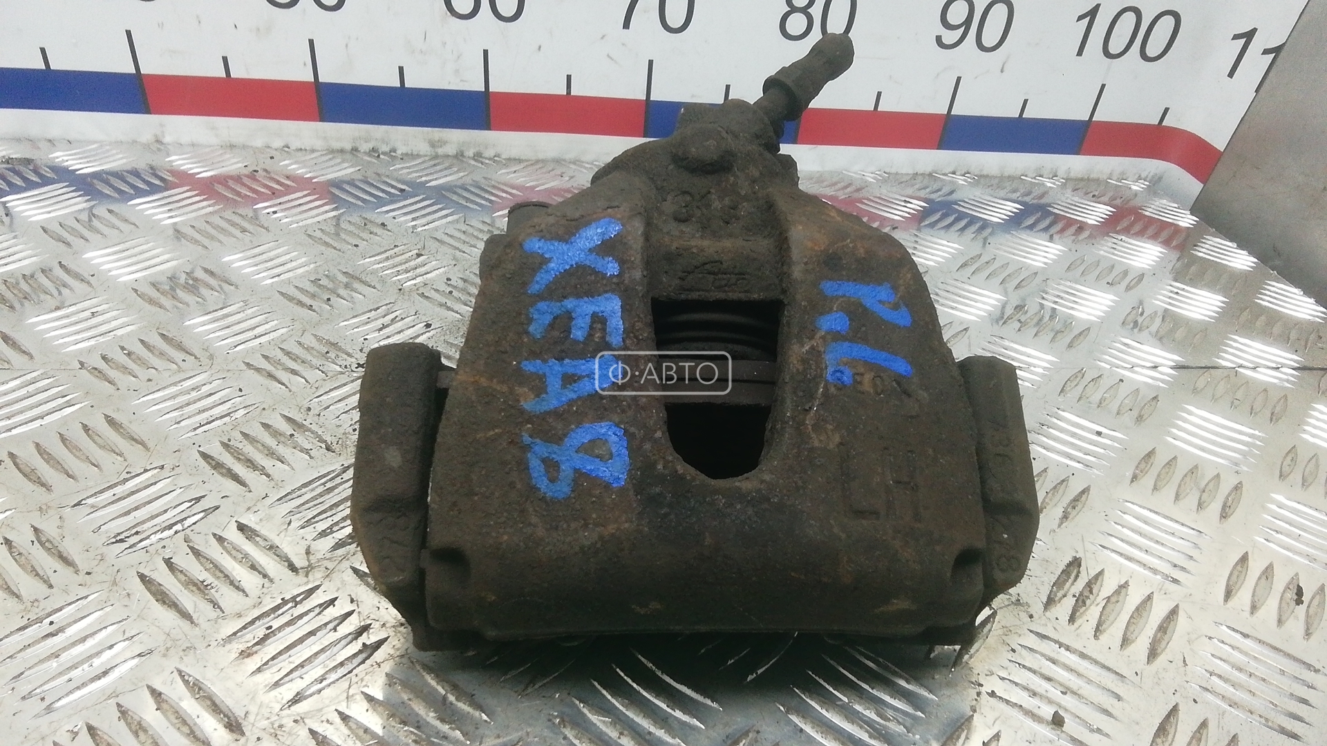 Суппорт тормозной передний левый