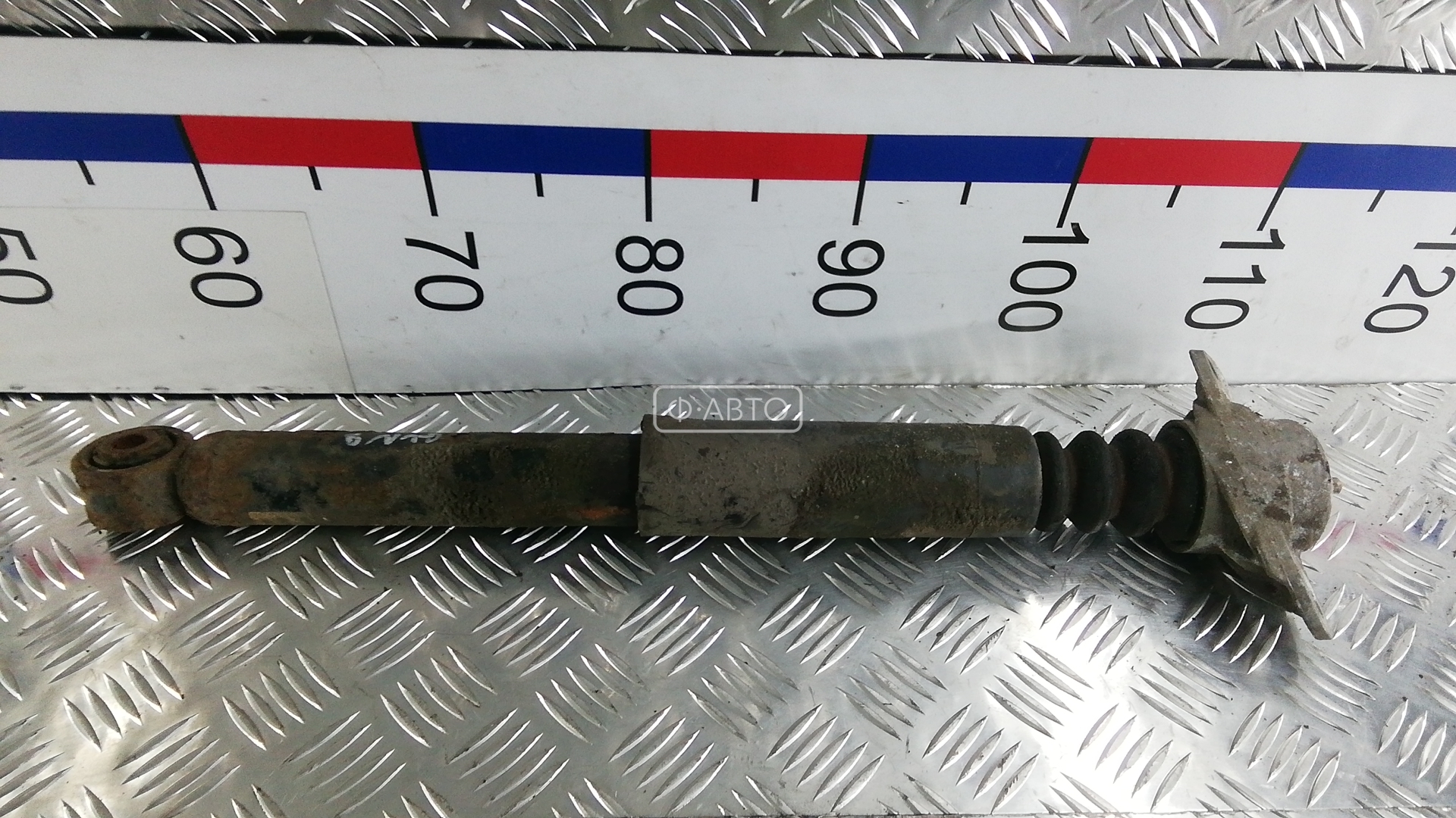 Амортизатор задней балки