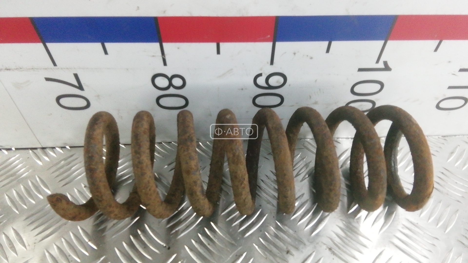 Пружина задняя