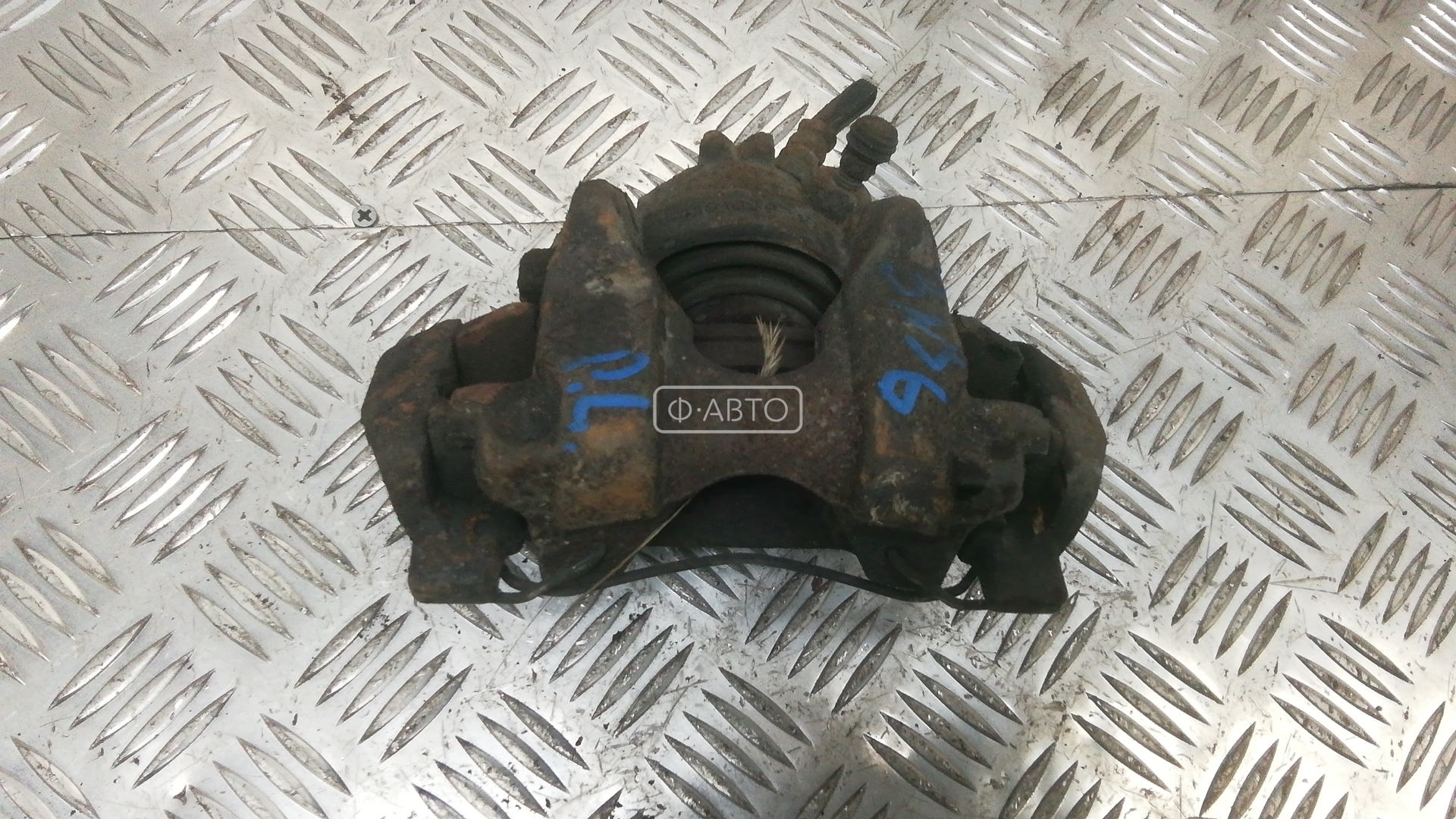 Суппорт тормозной передний левый