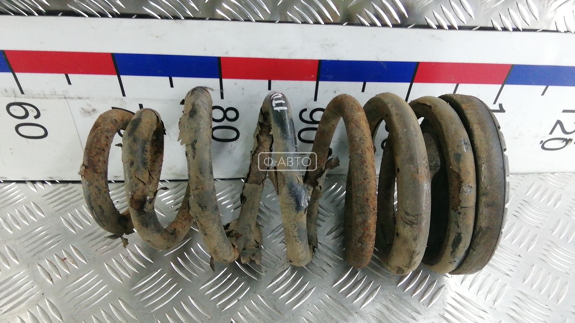 Пружина задняя