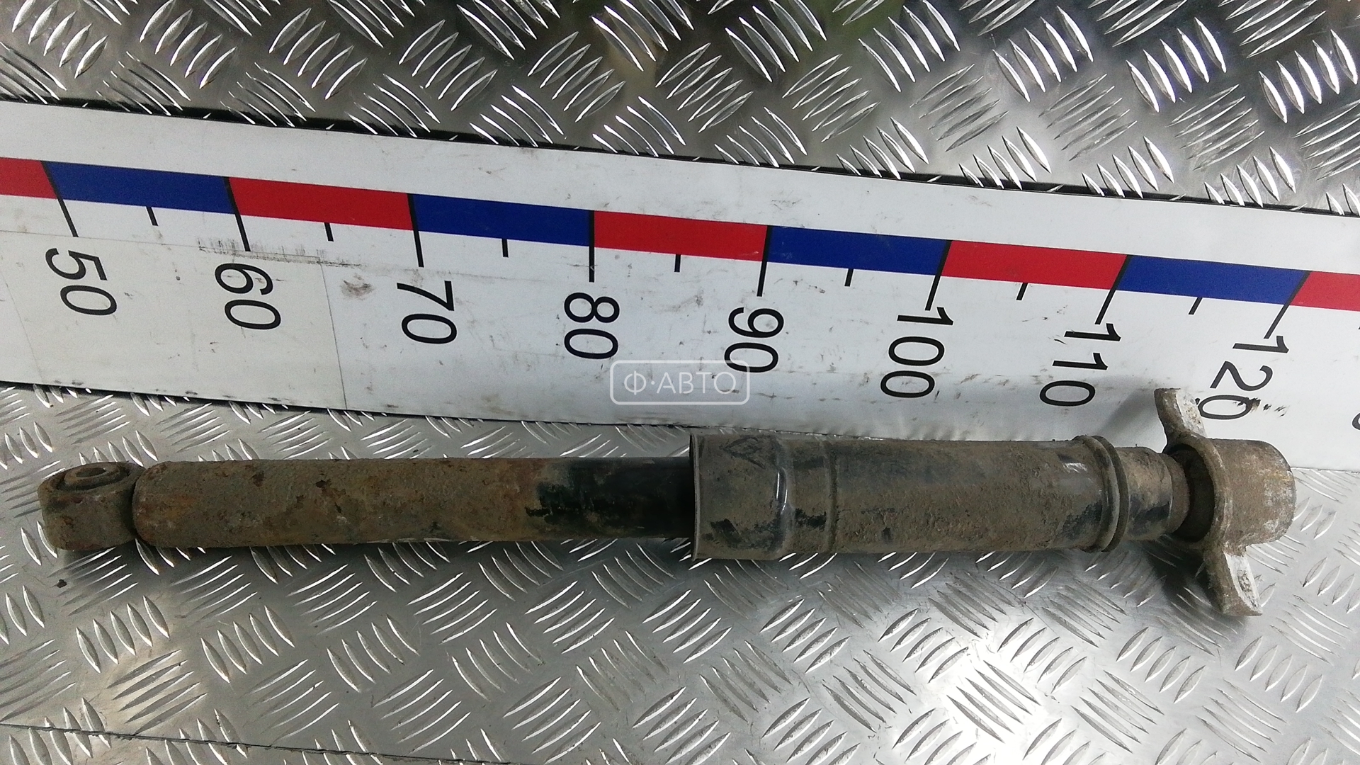 Амортизатор задней балки