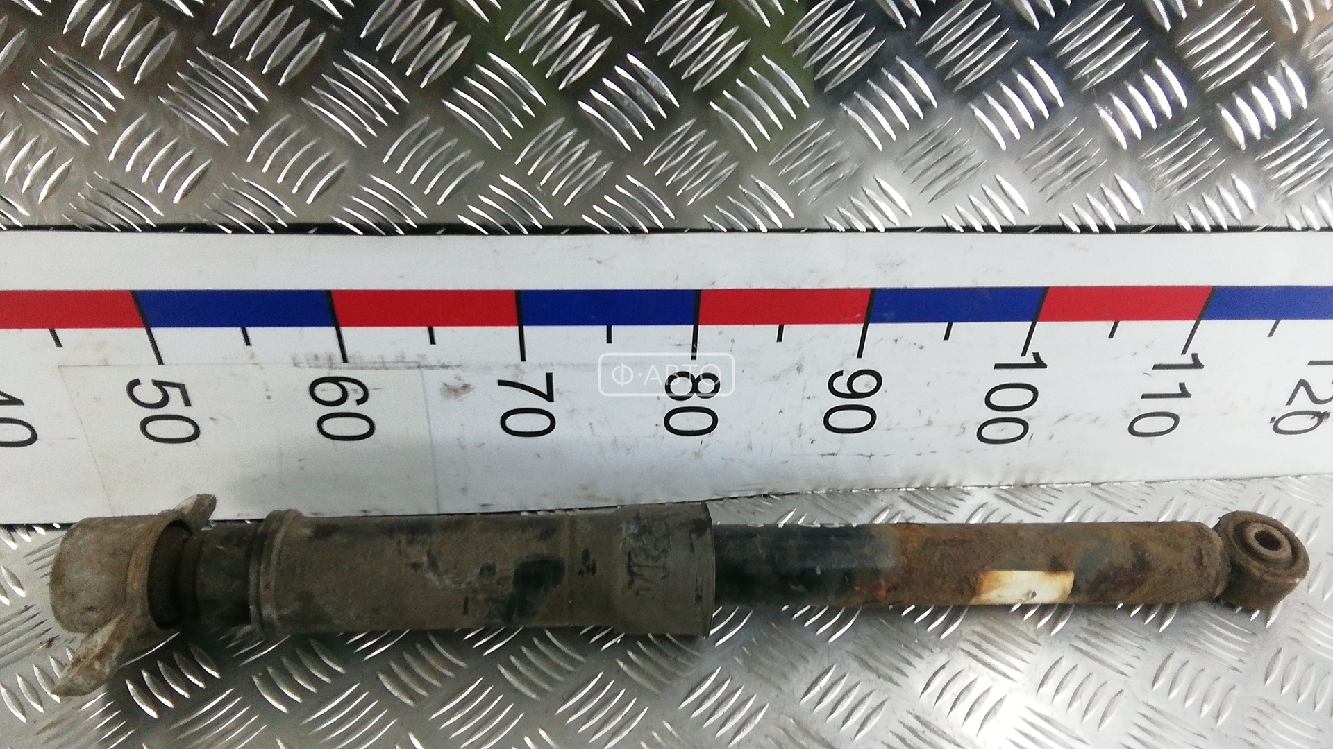 Амортизатор задней балки