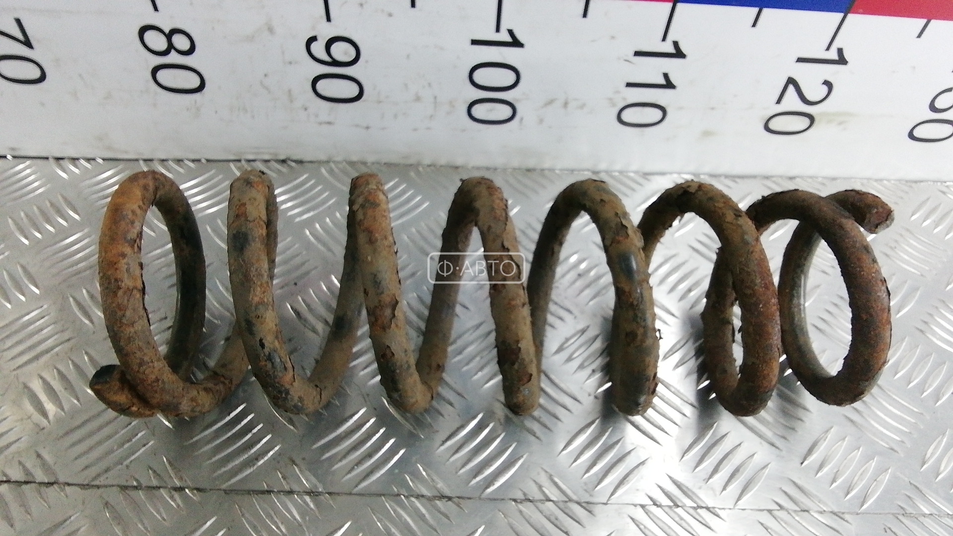 Пружина задняя