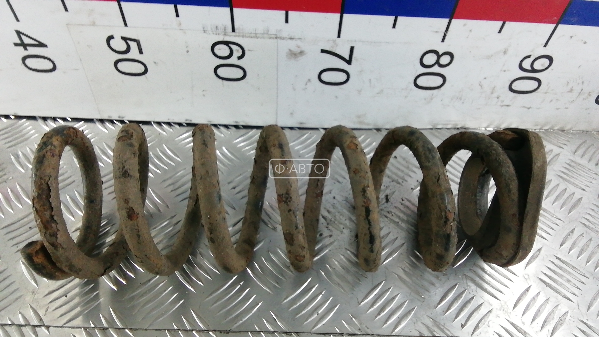 Пружина задняя