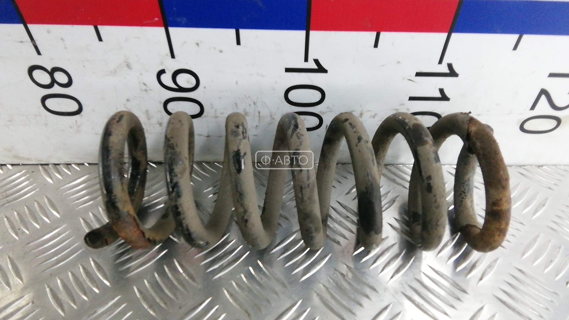 Пружина задняя