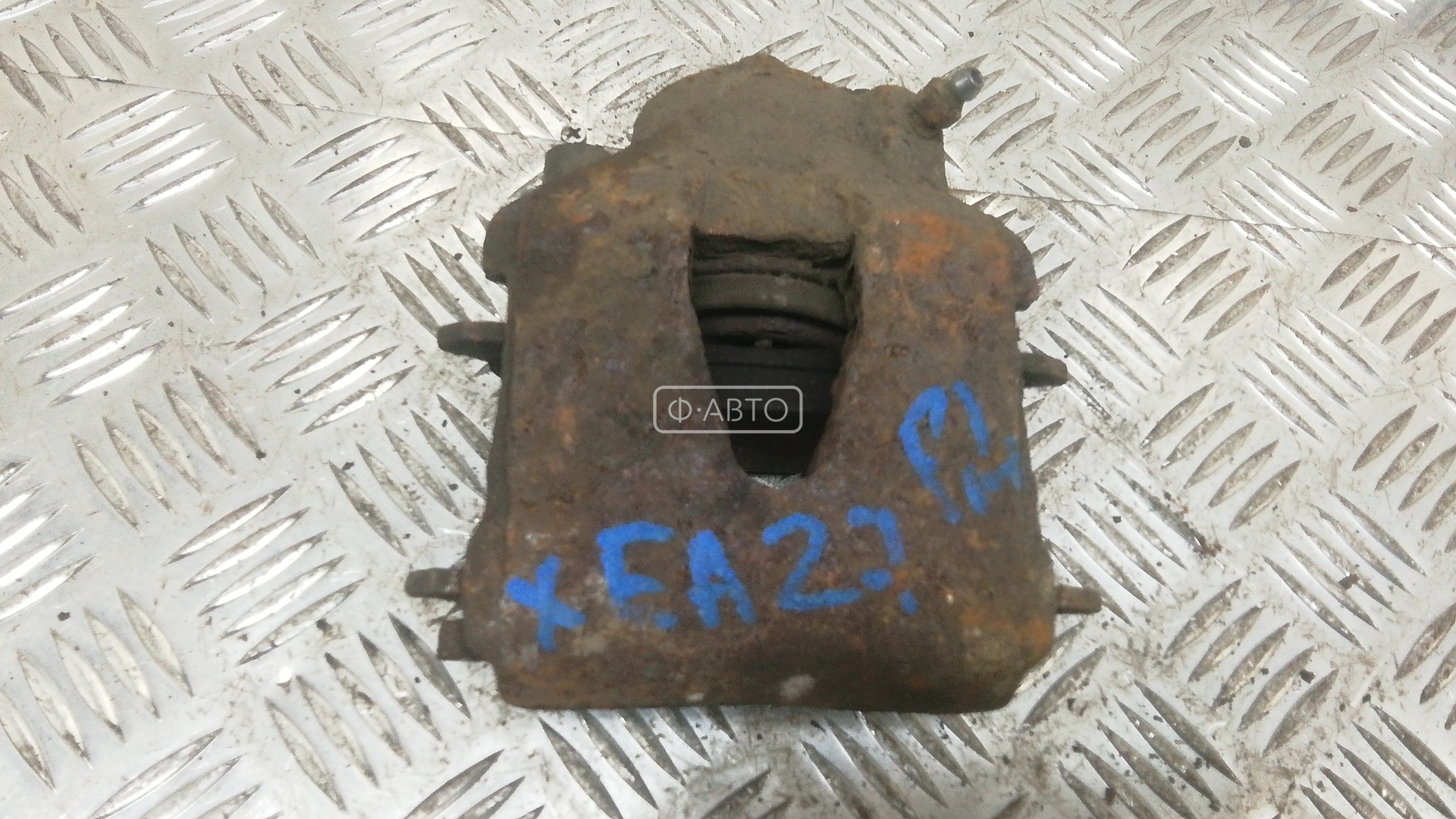 Суппорт тормозной передний левый