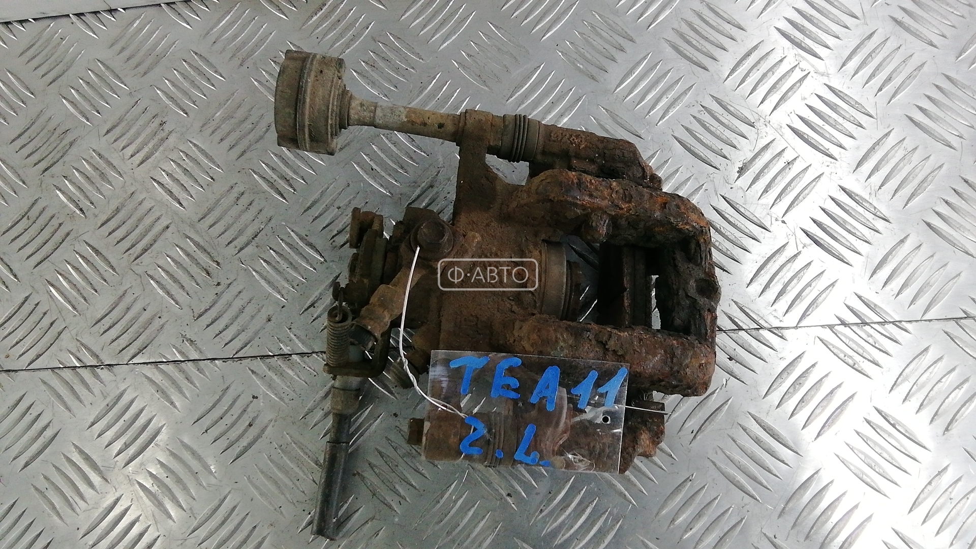 Суппорт тормозной задний левый