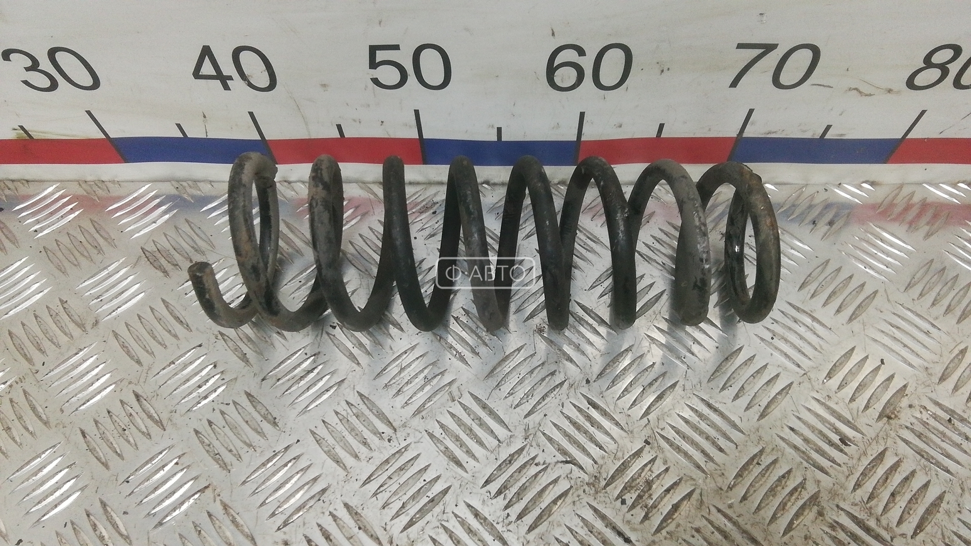 Пружина задняя