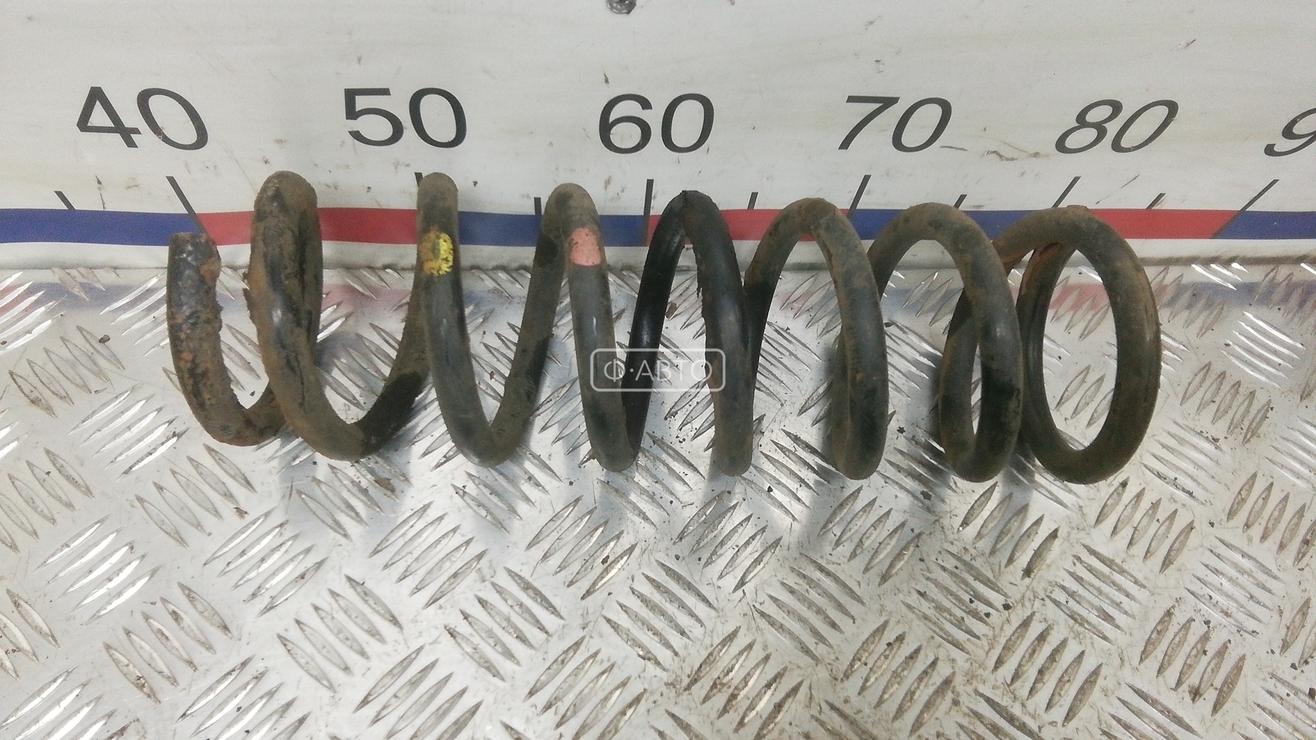 Пружина задняя