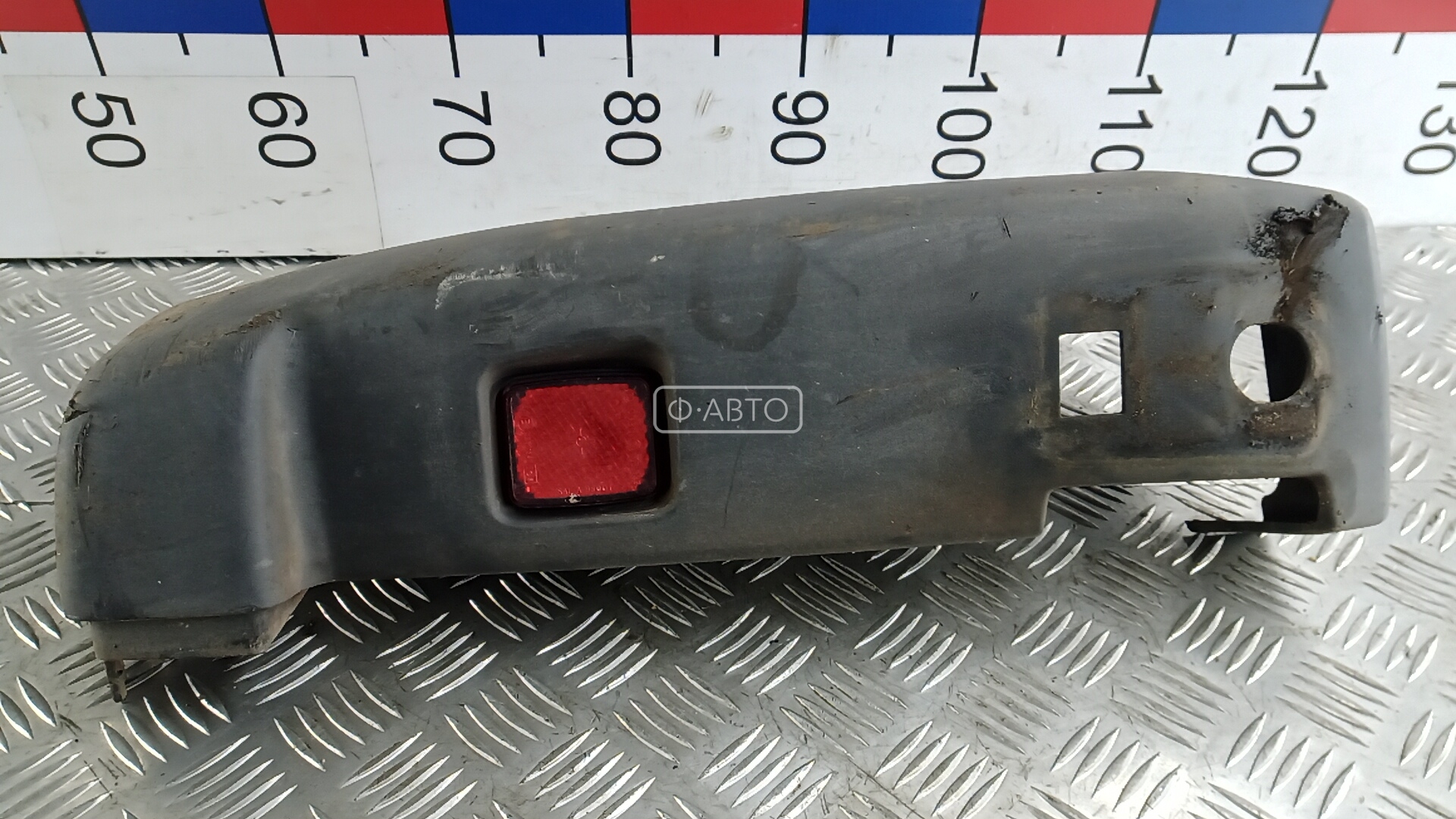 Клык бампера задний левый