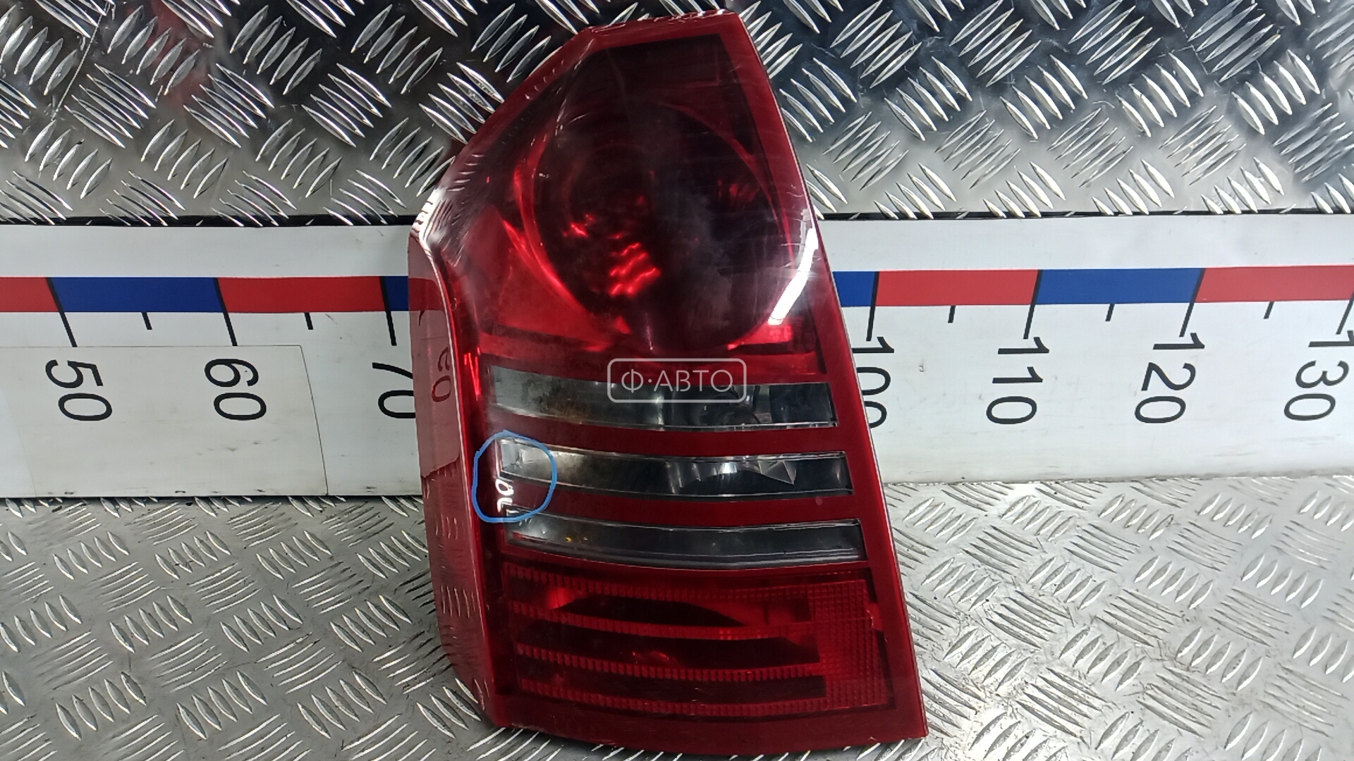 Фонарь задний левый