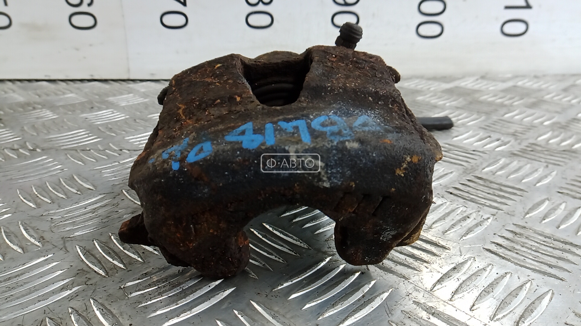 Суппорт тормозной передний левый