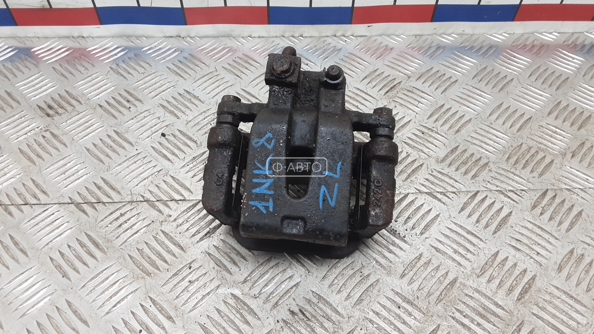 Суппорт тормозной задний левый