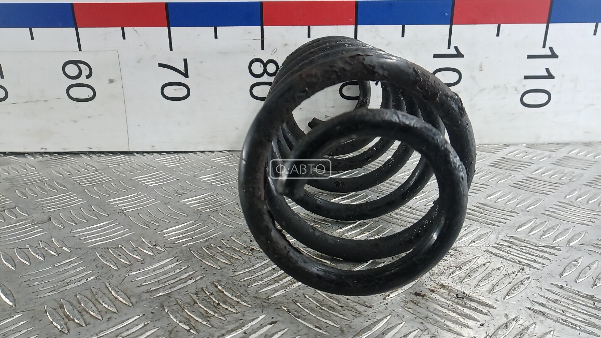 Пружина задняя