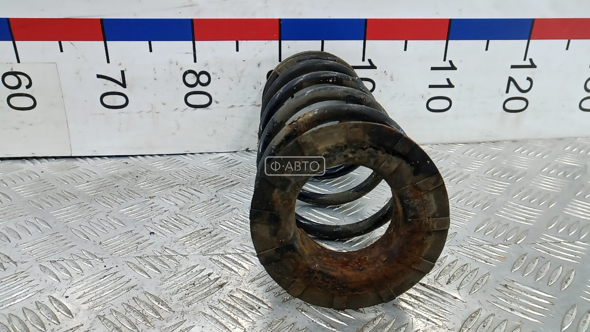 Пружина задняя