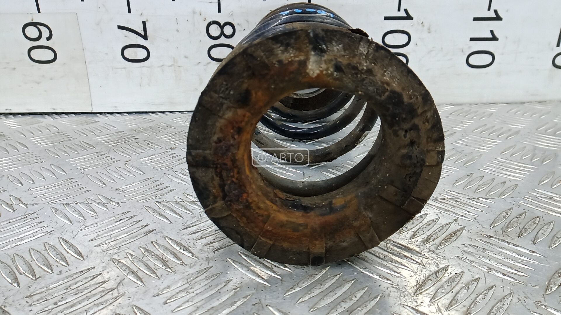 Пружина задняя