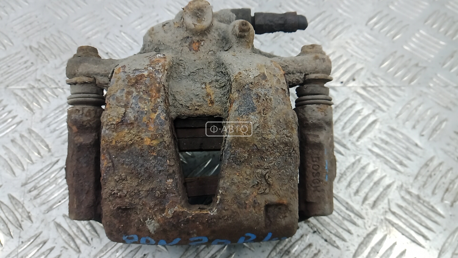 Суппорт тормозной передний левый