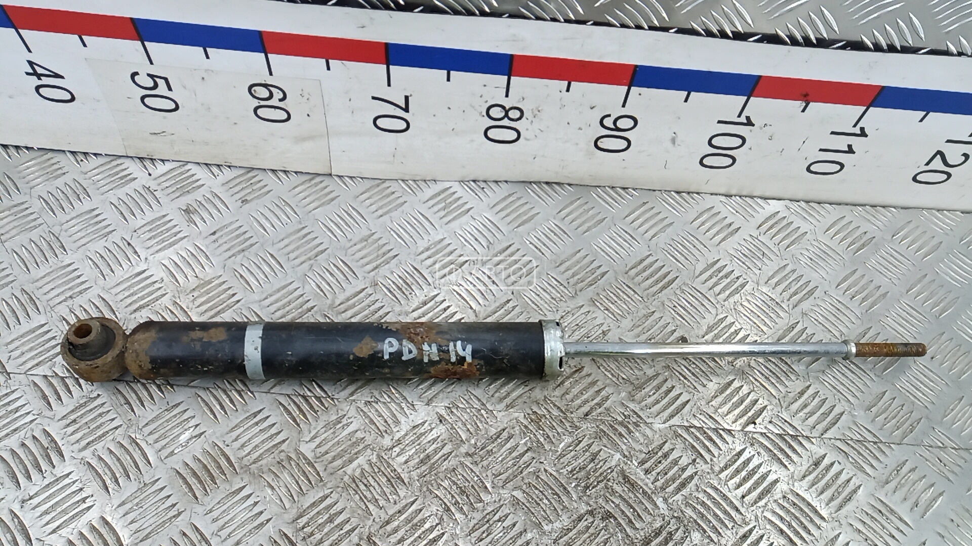 Амортизатор задней балки