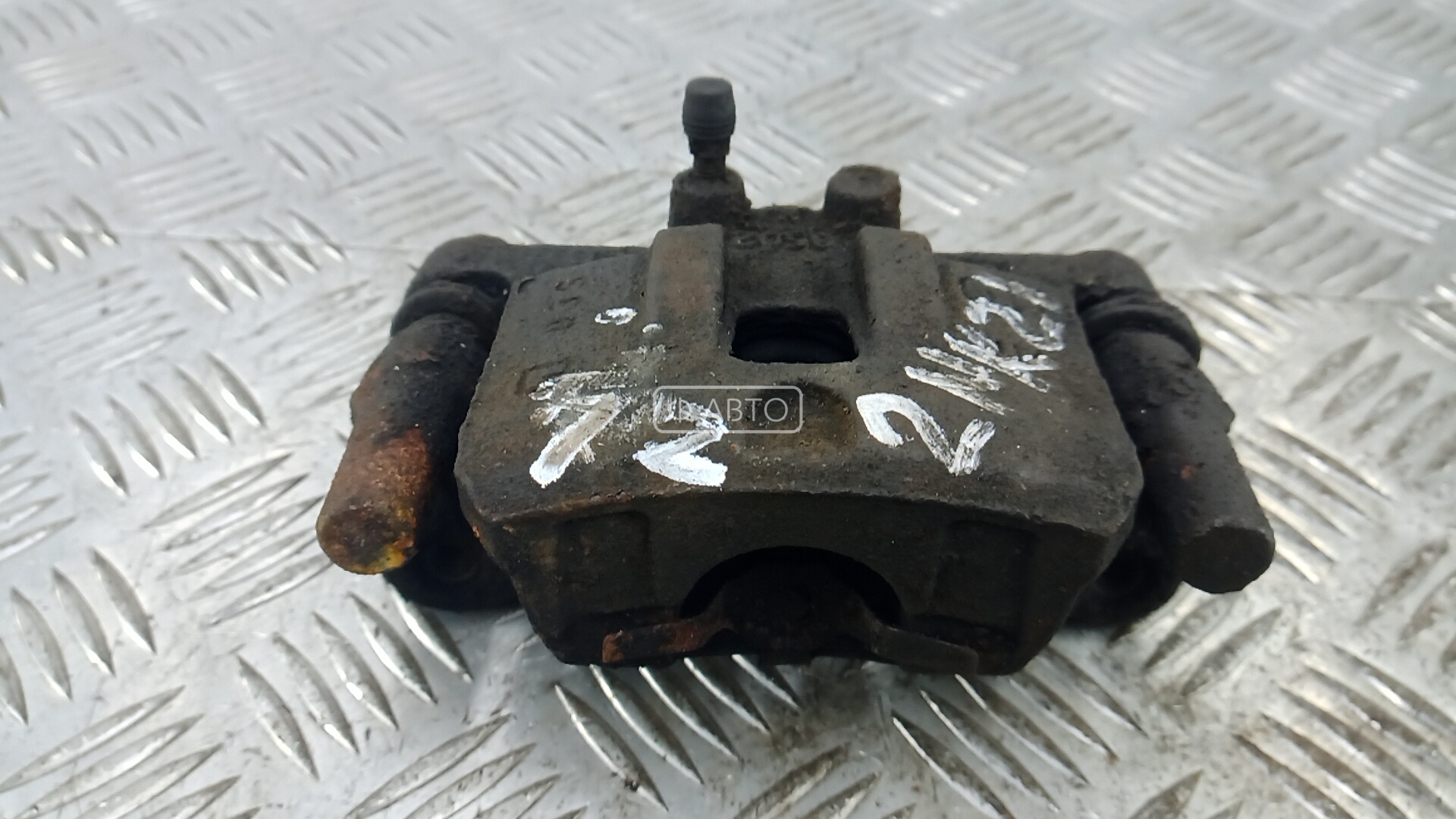 Суппорт тормозной задний левый