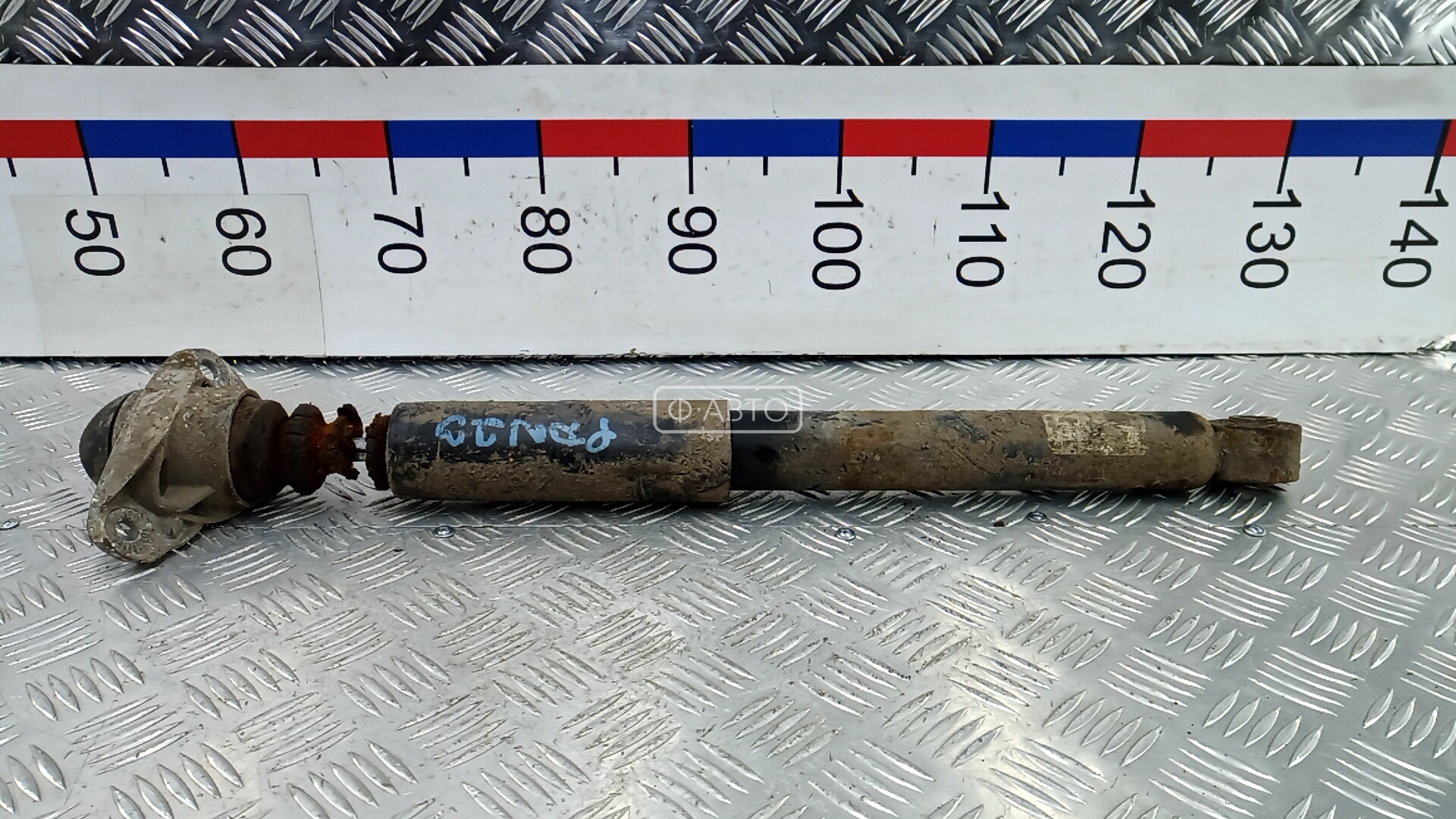 Амортизатор задней балки