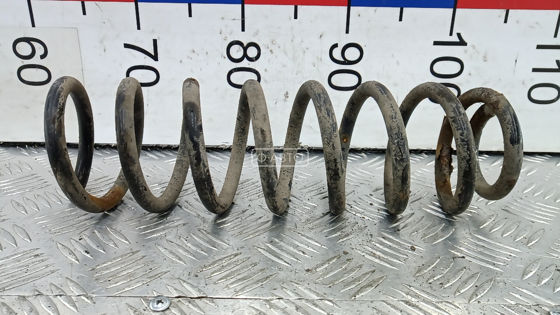 Пружина задняя