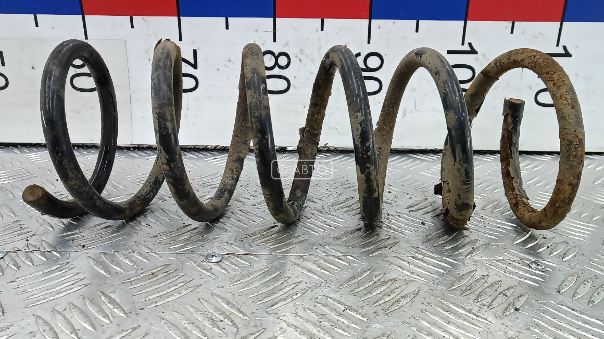 Пружина задняя