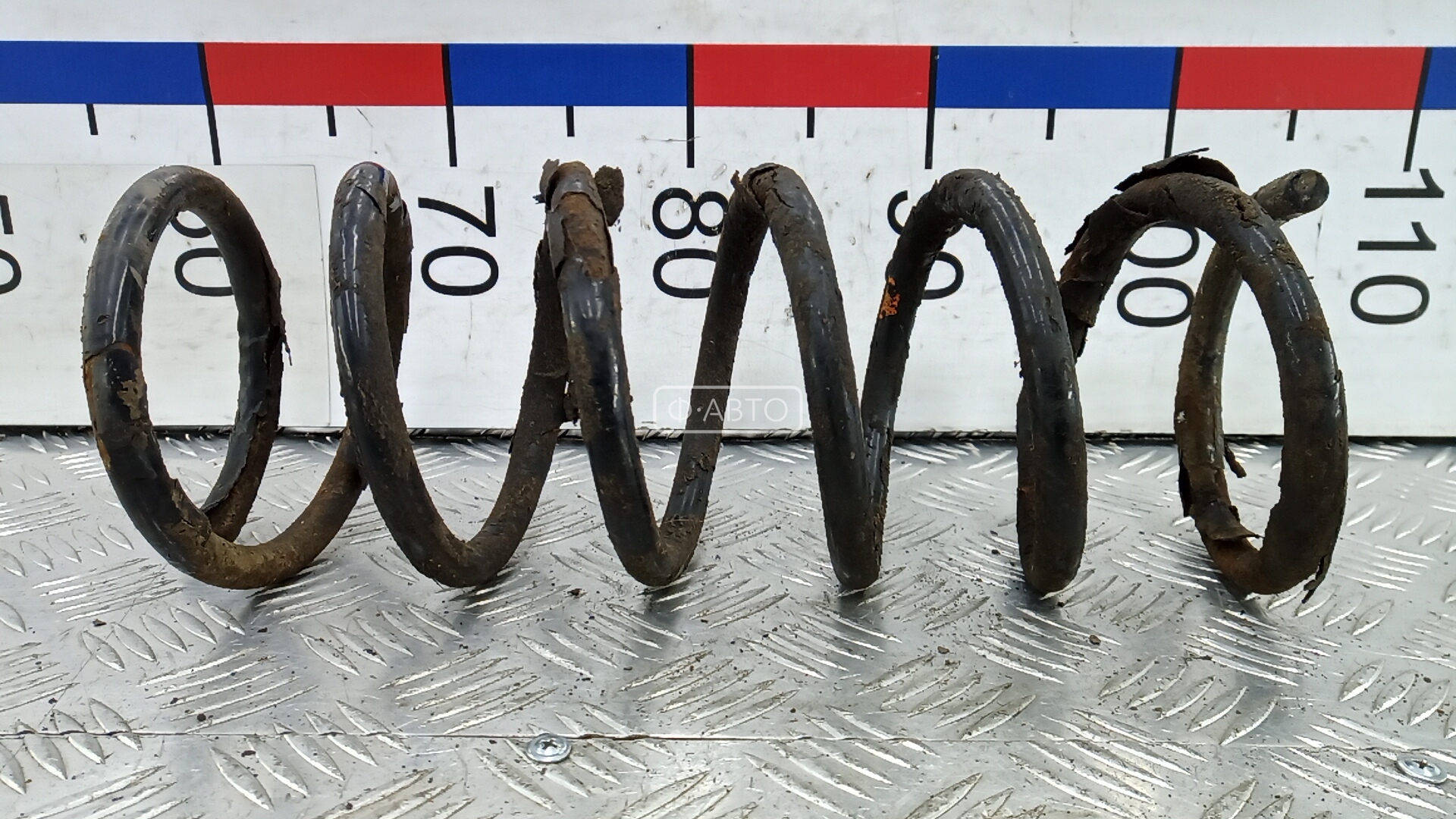 Пружина задняя