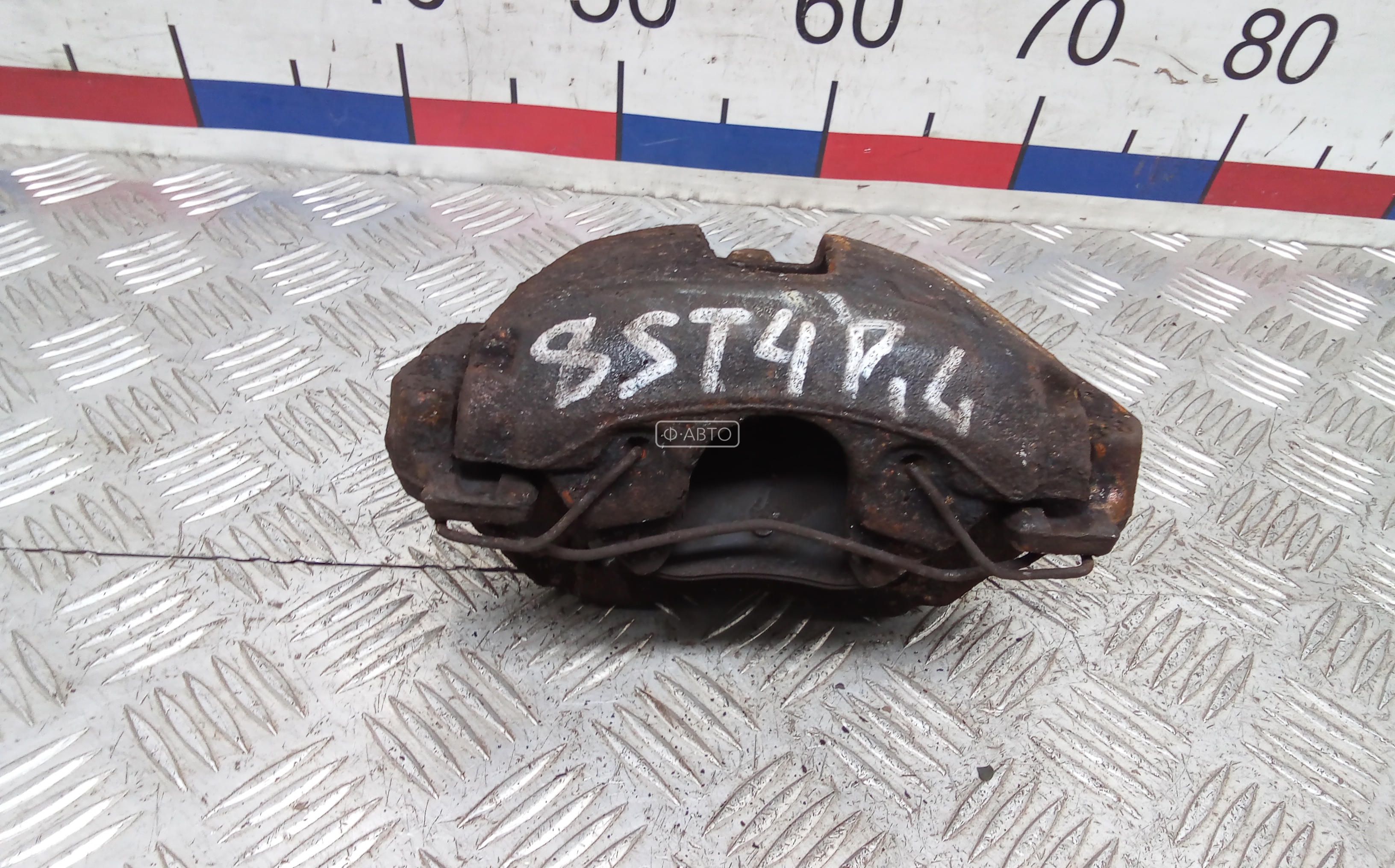 Суппорт тормозной передний левый