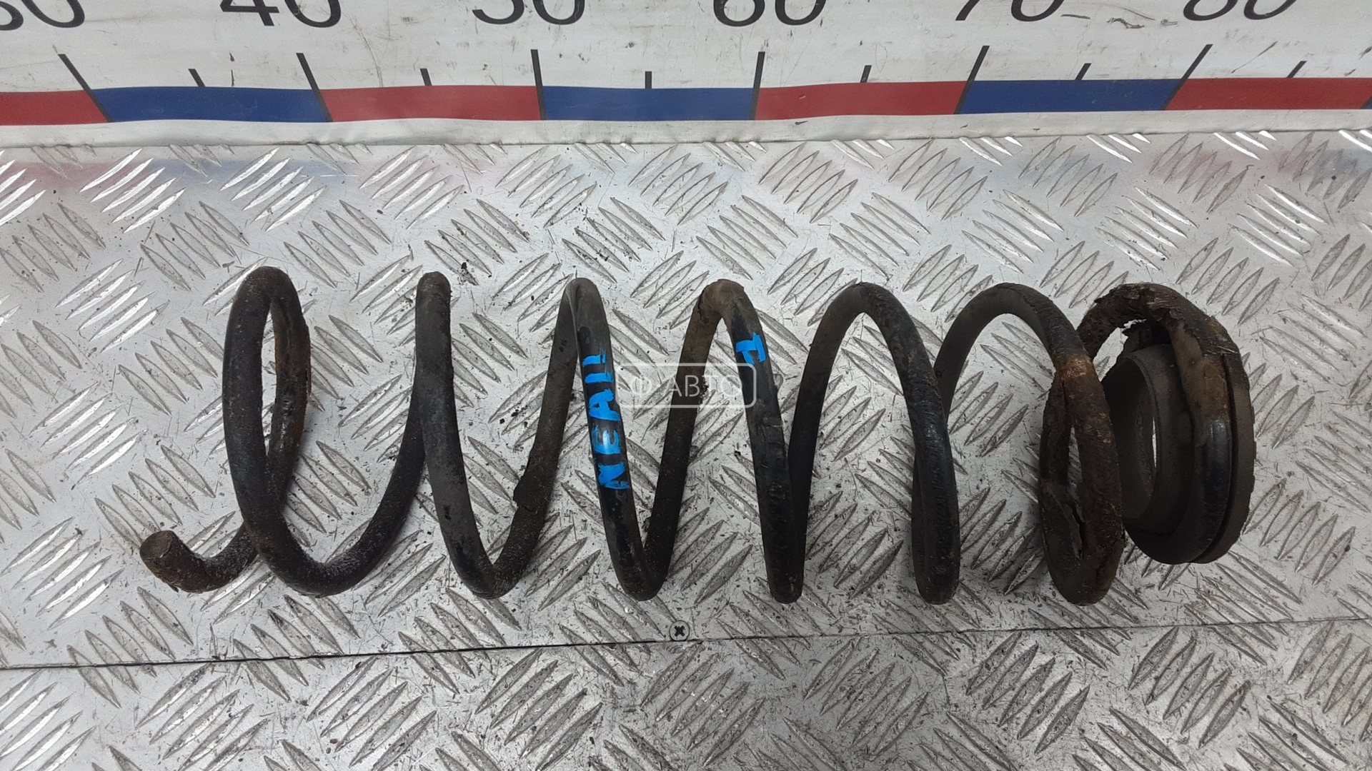 Пружина задняя