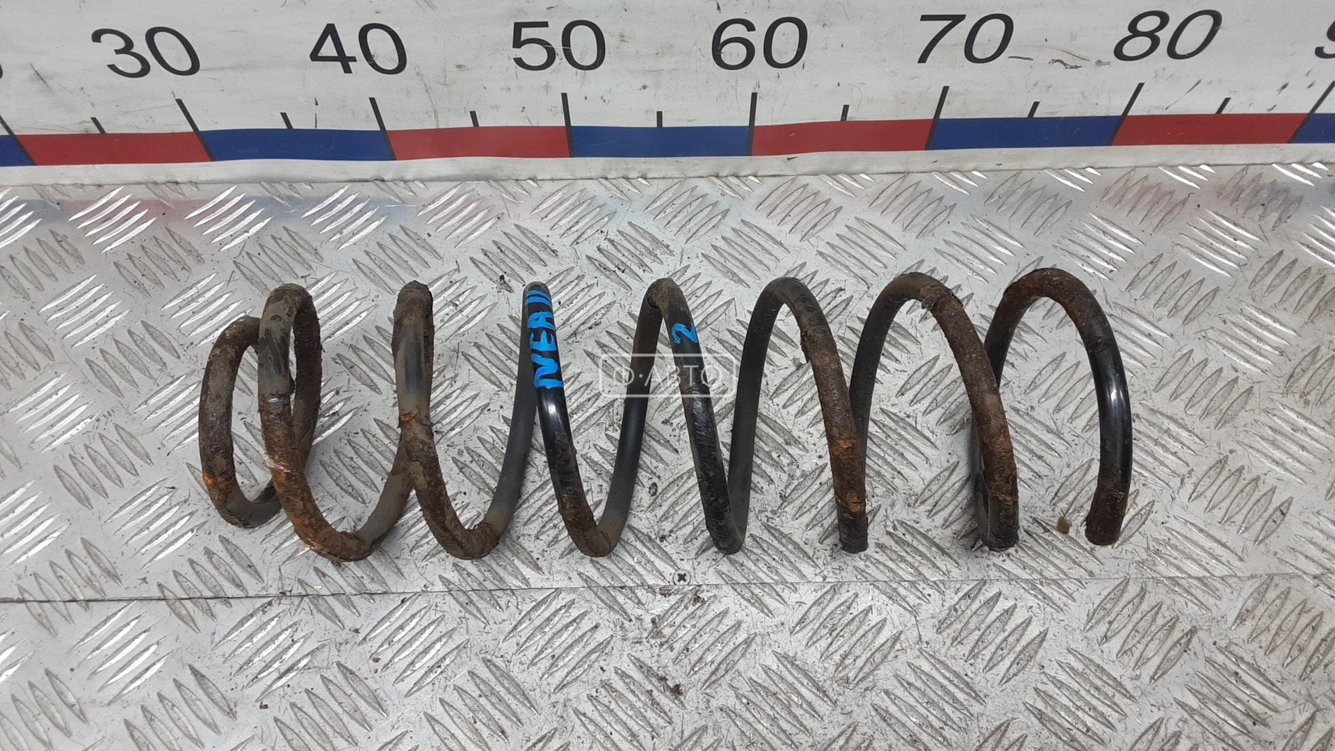 Пружина задняя