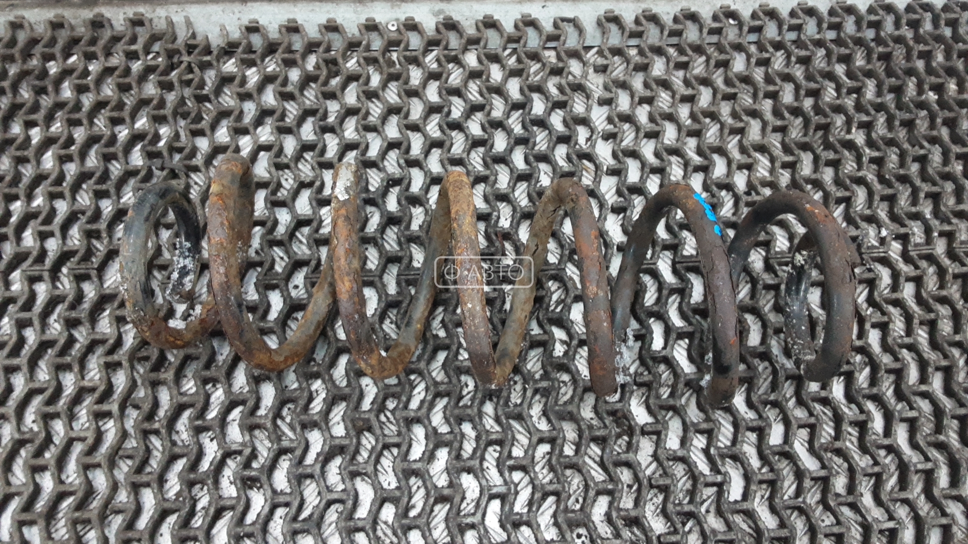 Пружина задняя