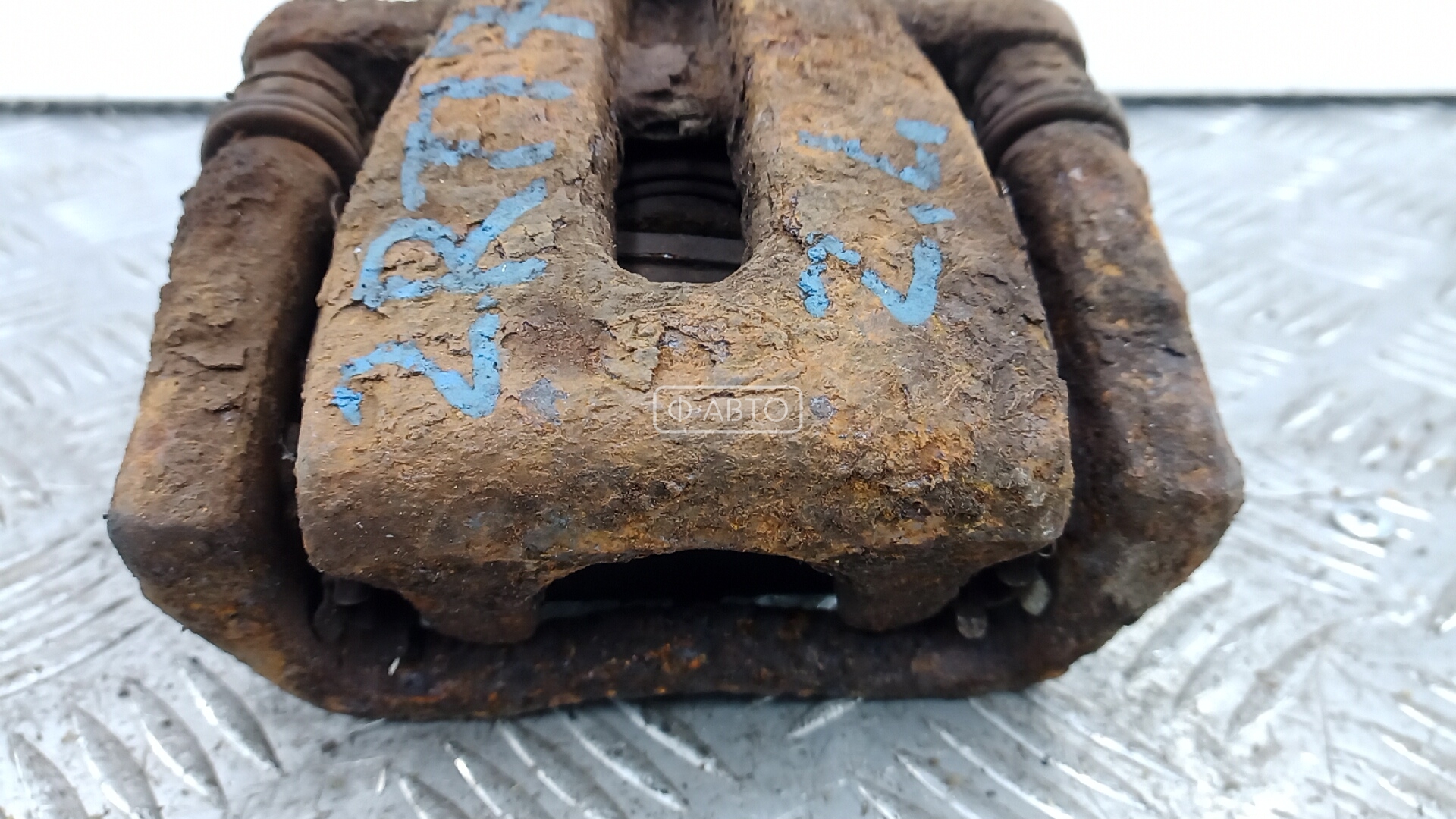 Суппорт тормозной задний левый