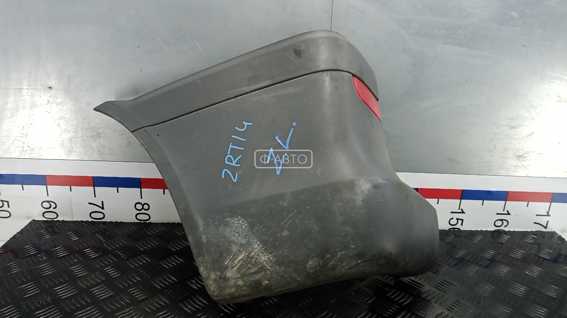 Клык бампера задний левый