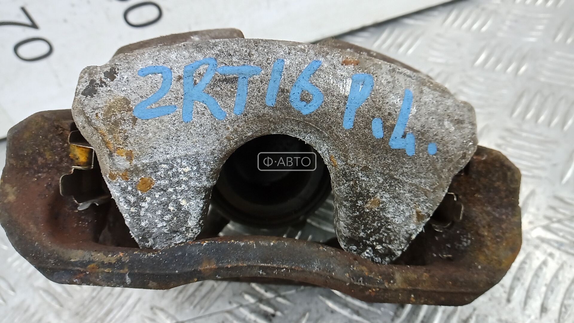 Суппорт тормозной передний левый