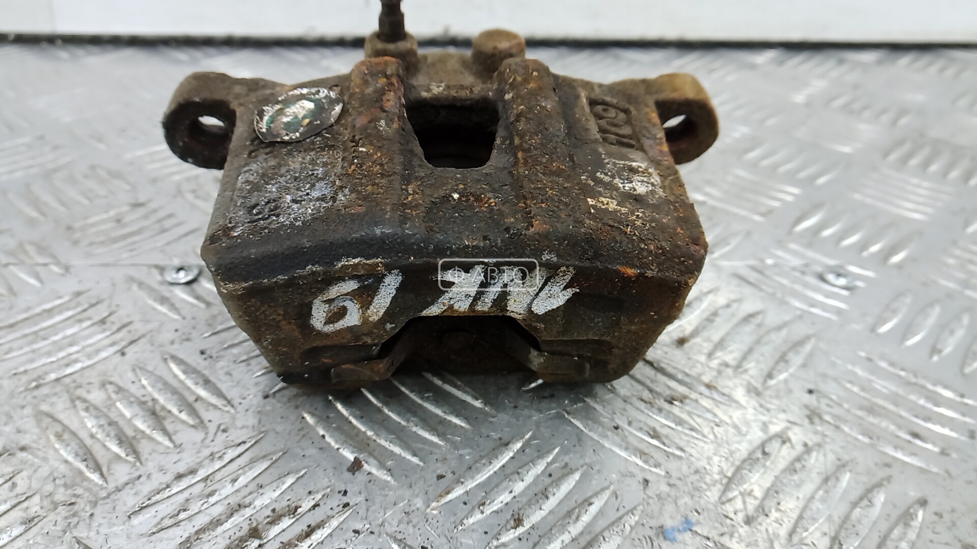 Суппорт тормозной задний левый