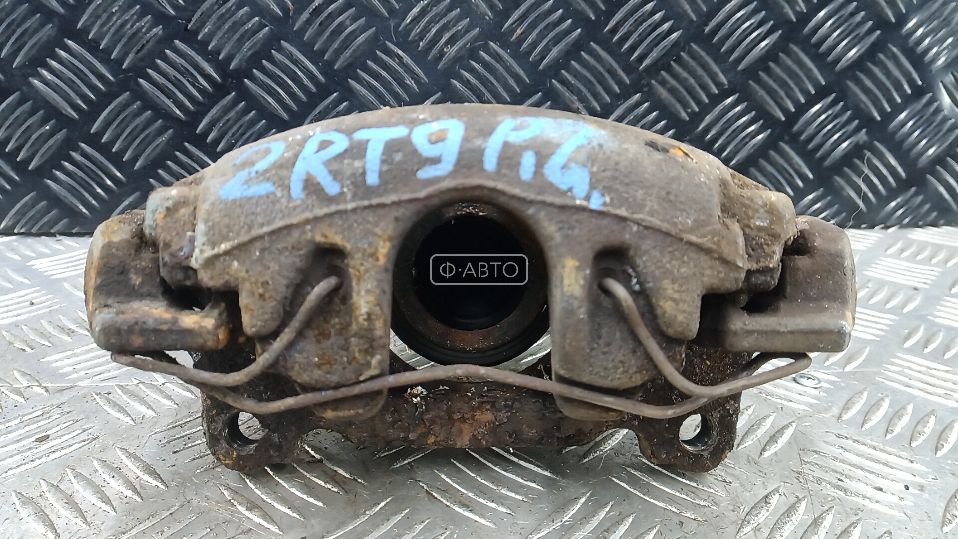 Суппорт тормозной передний левый