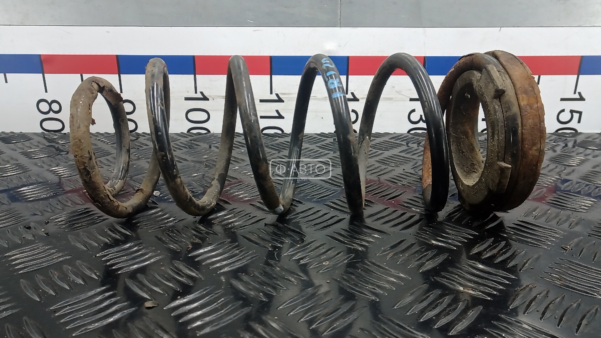 Пружина задняя