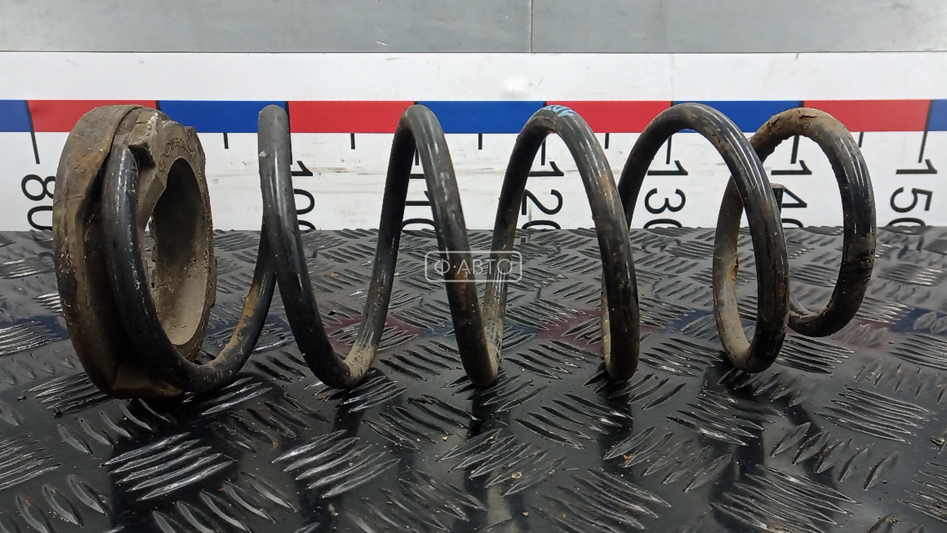 Пружина задняя