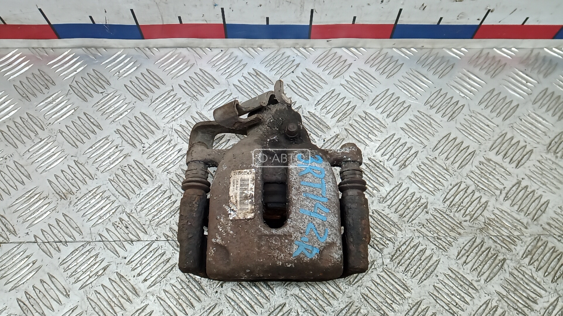 Суппорт тормозной задний правый