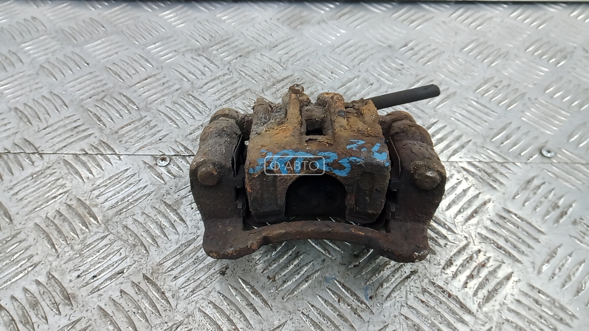 Суппорт тормозной задний левый