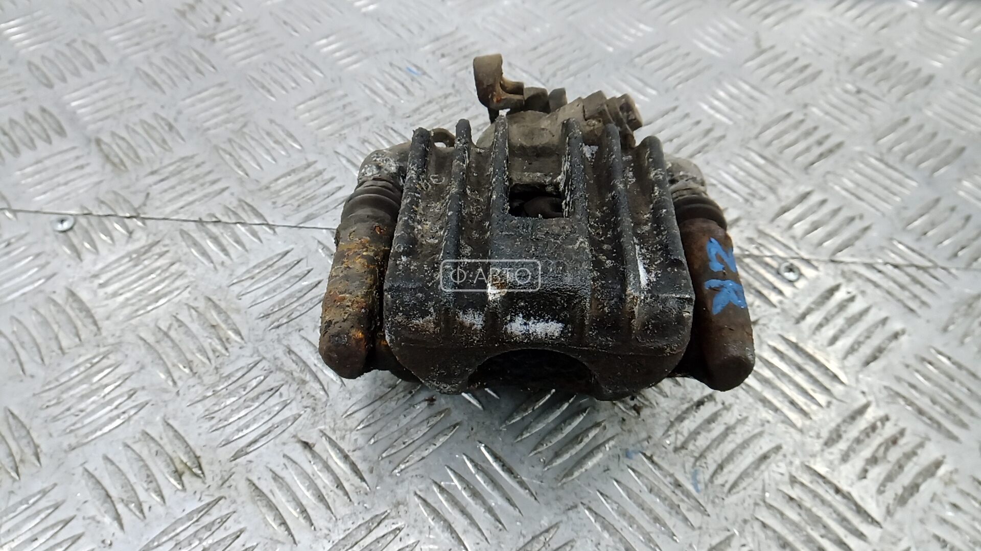 Суппорт тормозной задний правый