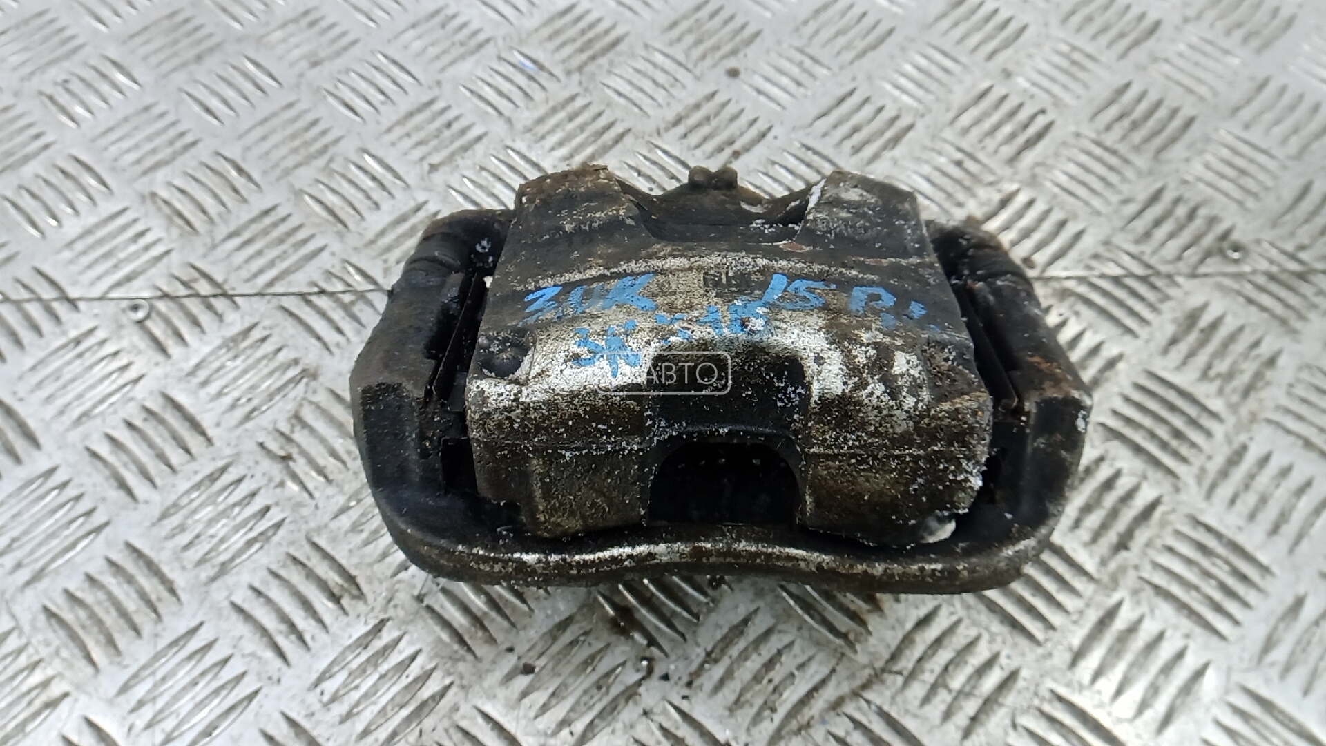 Суппорт тормозной передний левый