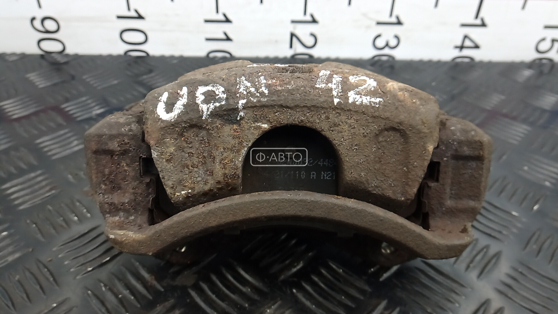 Суппорт тормозной передний левый