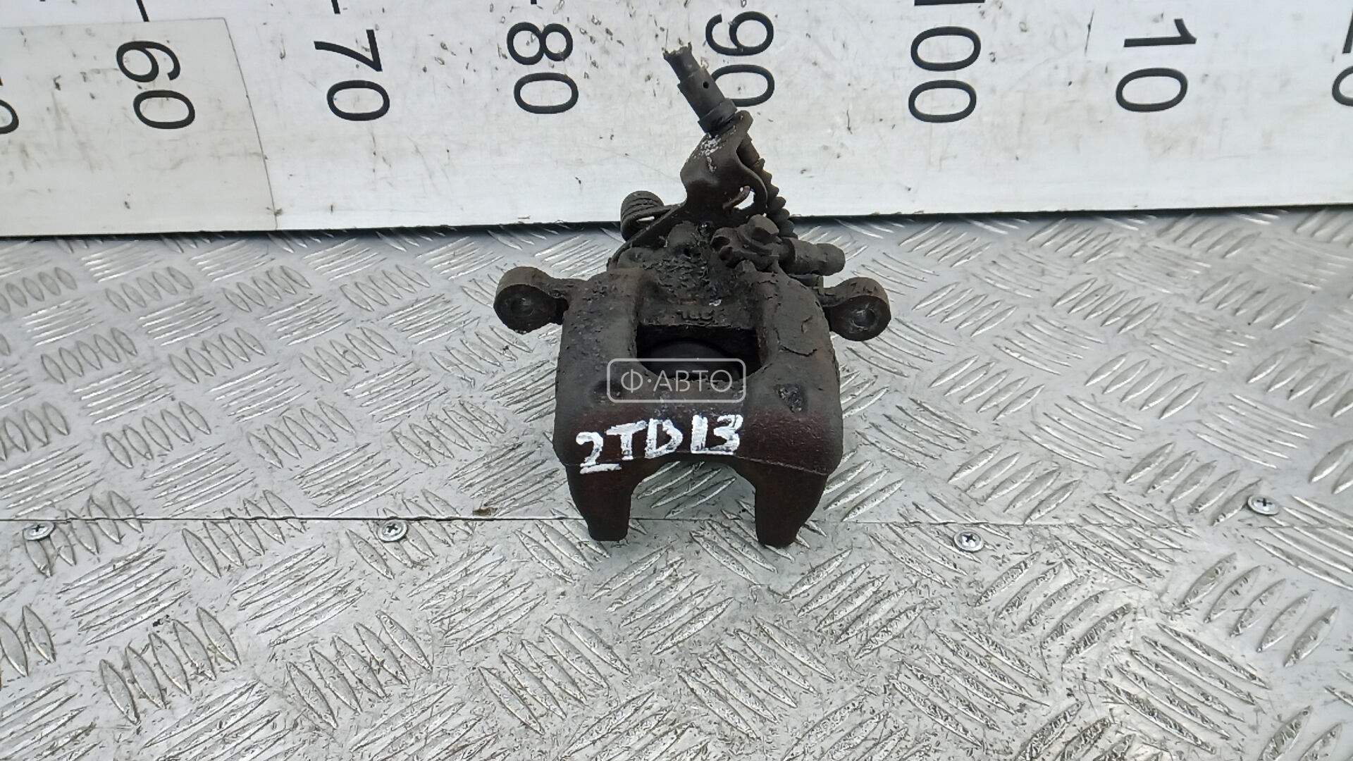 Суппорт тормозной задний левый