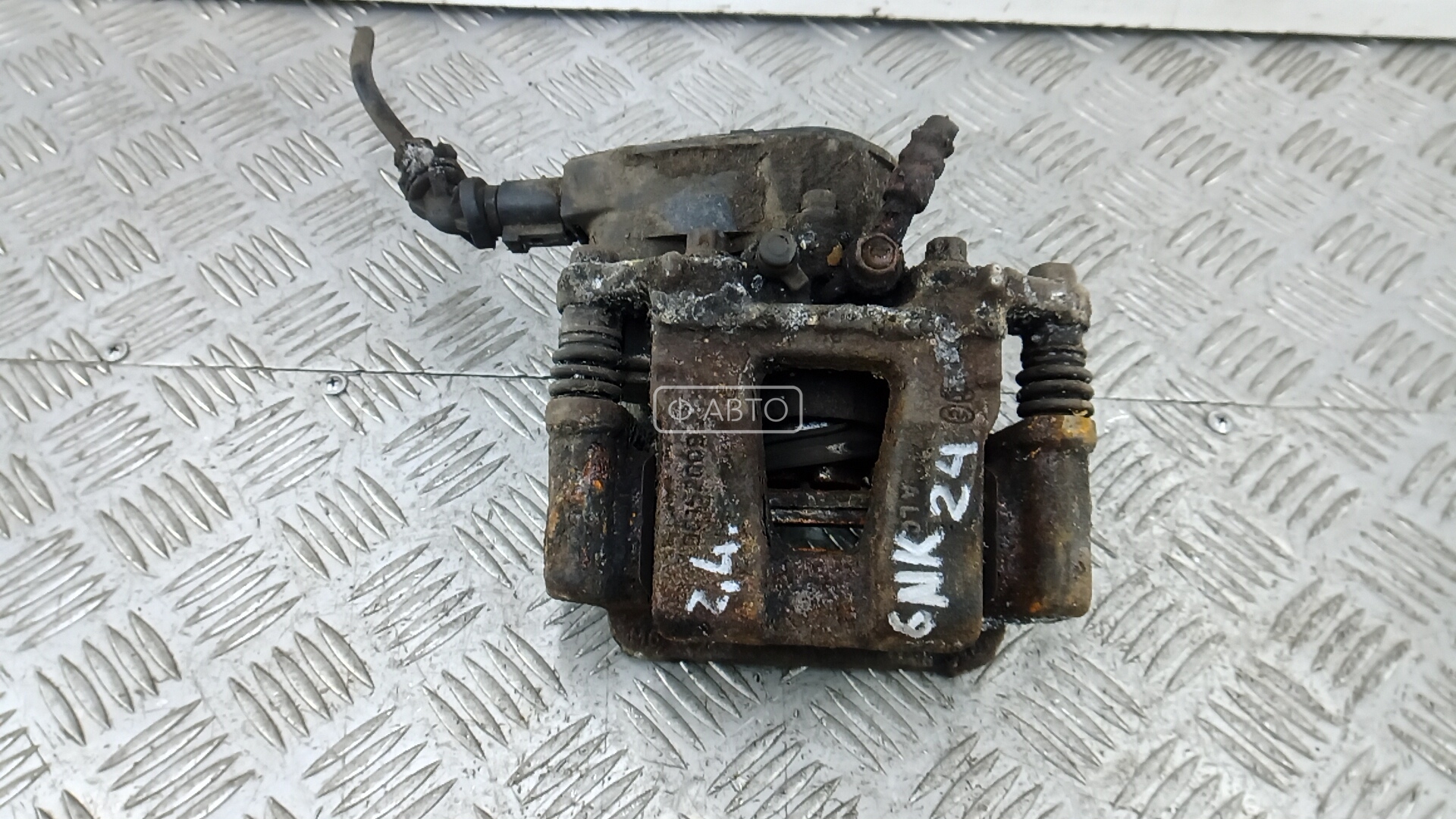 Суппорт тормозной задний левый